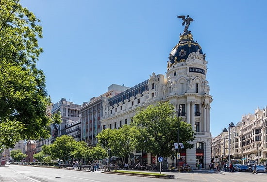 Walk on Gran Via, the most famous street in Madrid